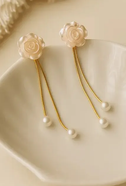 White camellia tassel earrings